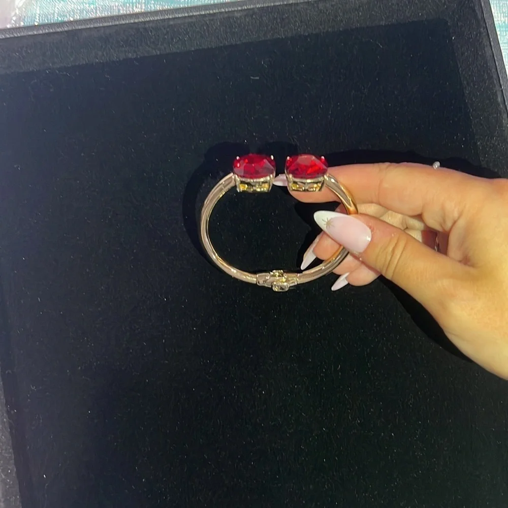 1312. Cara New York Elegant Gold and Red Stone Bracelet